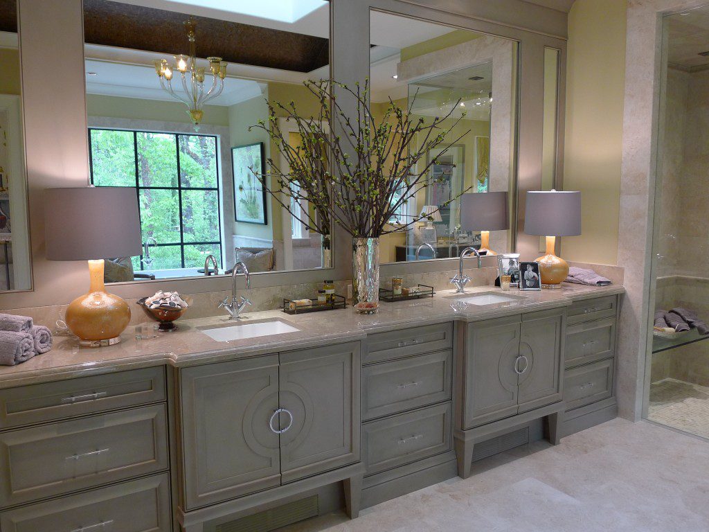 The small vanities in the bathroom completely change the look. The cabinets, small vases, and flowers gives a mellow look. The cheap bathroom vanities like tiles is great for renovation. The tiles are available in ceramic, natural stone and ceramic.